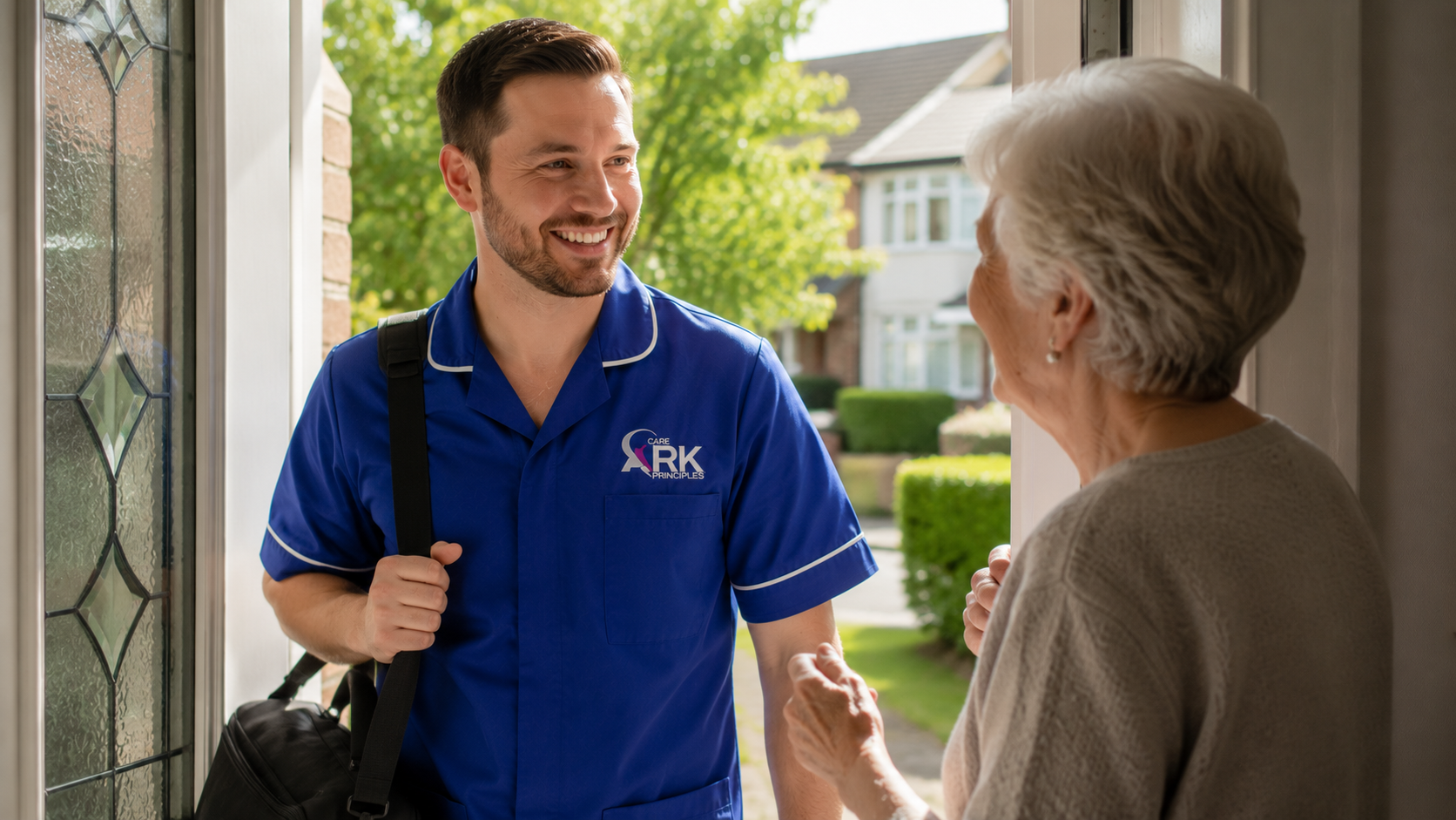 Ark Care Principles carer supporting an elderly woman with dementia at mealtime during a home visit